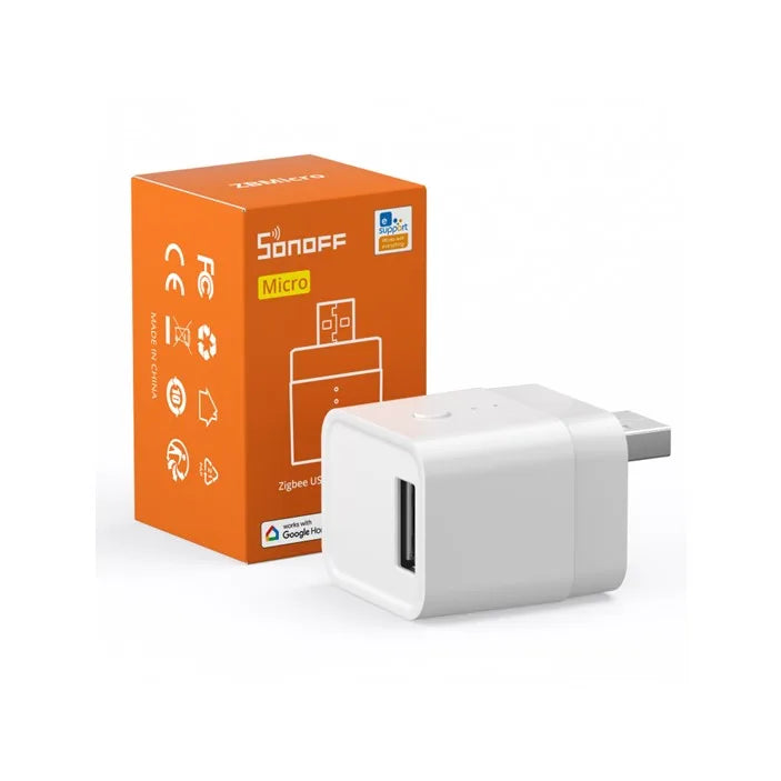 White electronic device next to an orange Sonoff Micro packaging on a white background