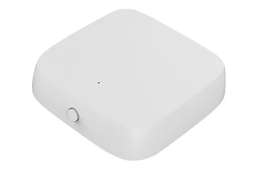 White rectangular device with a circular button on a white background