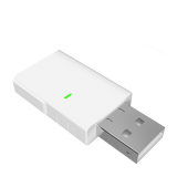 White USB adapter with a green indicator light on a white background