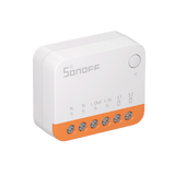 Sonoff device with white body and orange bottom section on a white background
